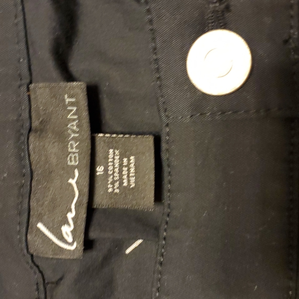 Lane Bryant Black leggings paisley front,solid Pointe knit fabric in back.